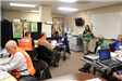 Distant Tsunami Exercise - Employees Working and Talking 3