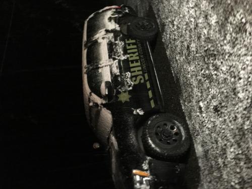 Sheriffs Company Vehicle Covered in Snow