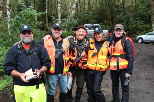Group of People Outfitted for Search and Rescue