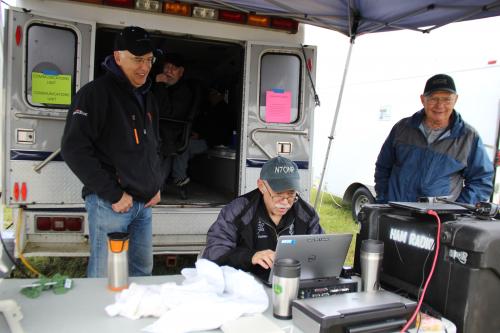 People Behind an Ambulance