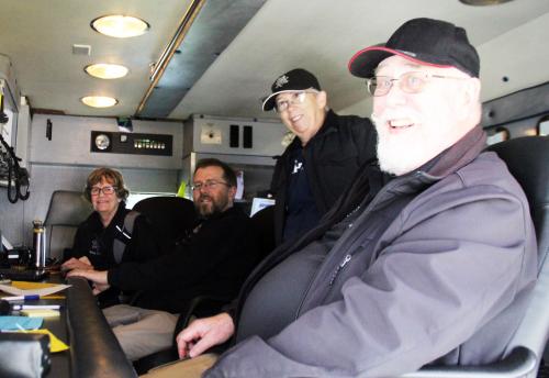 Four People Smiling