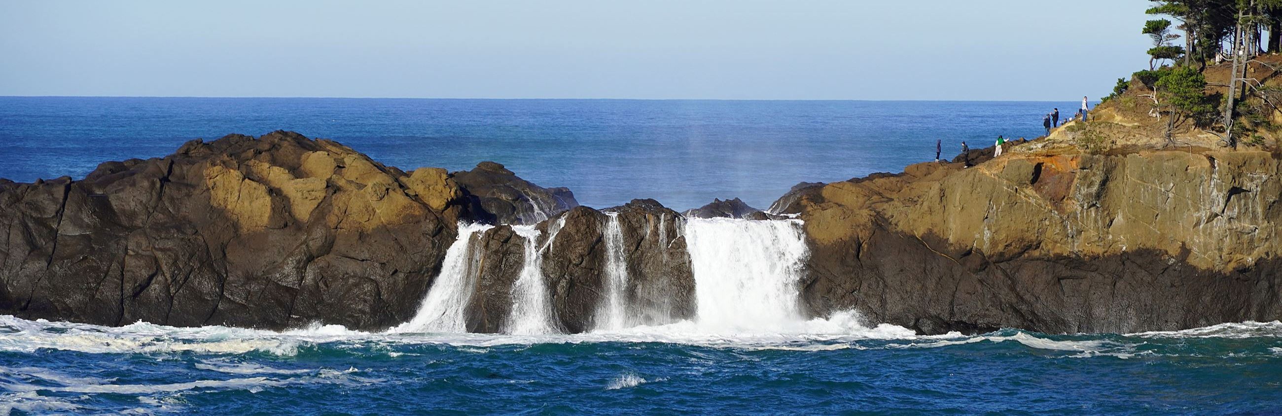 Visitors watch the November 2023 king tides in Depoe Bay