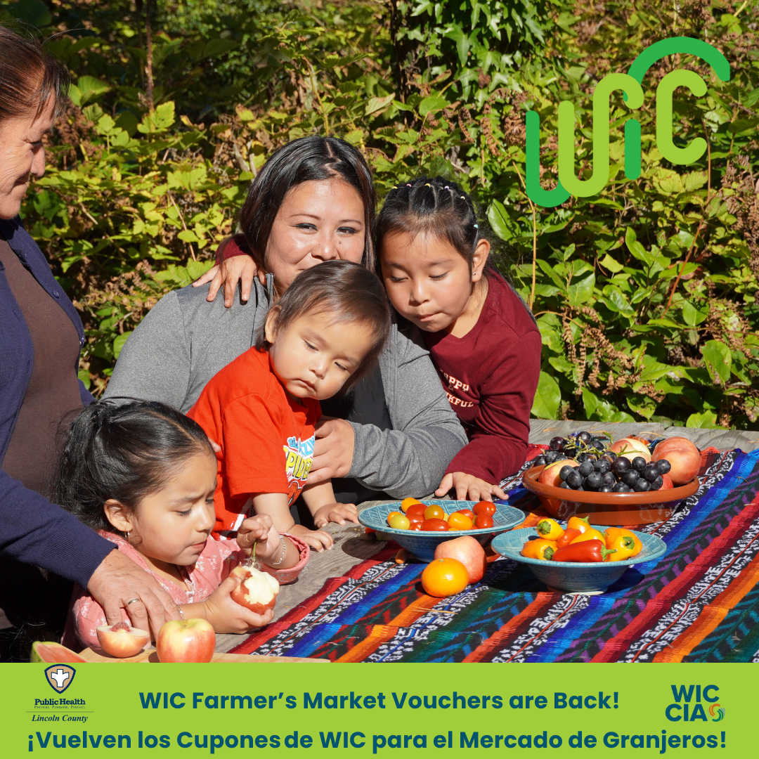 Image of family at a table outside WIC Farmer's Market Vouchers are Back! 