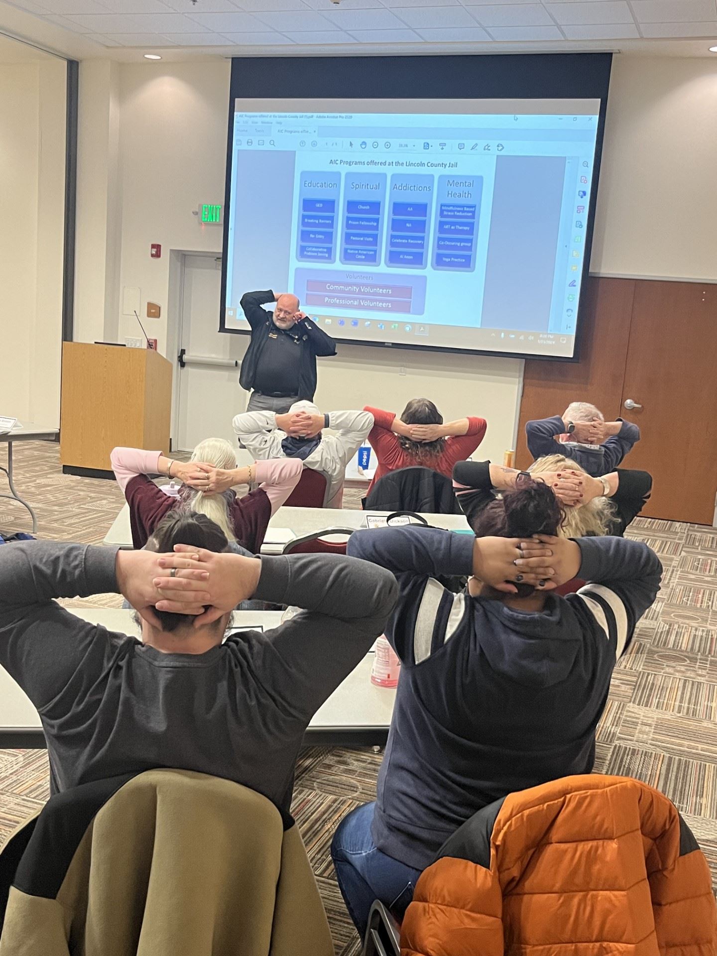 Dennis Buckmaster leading a breathing exercise